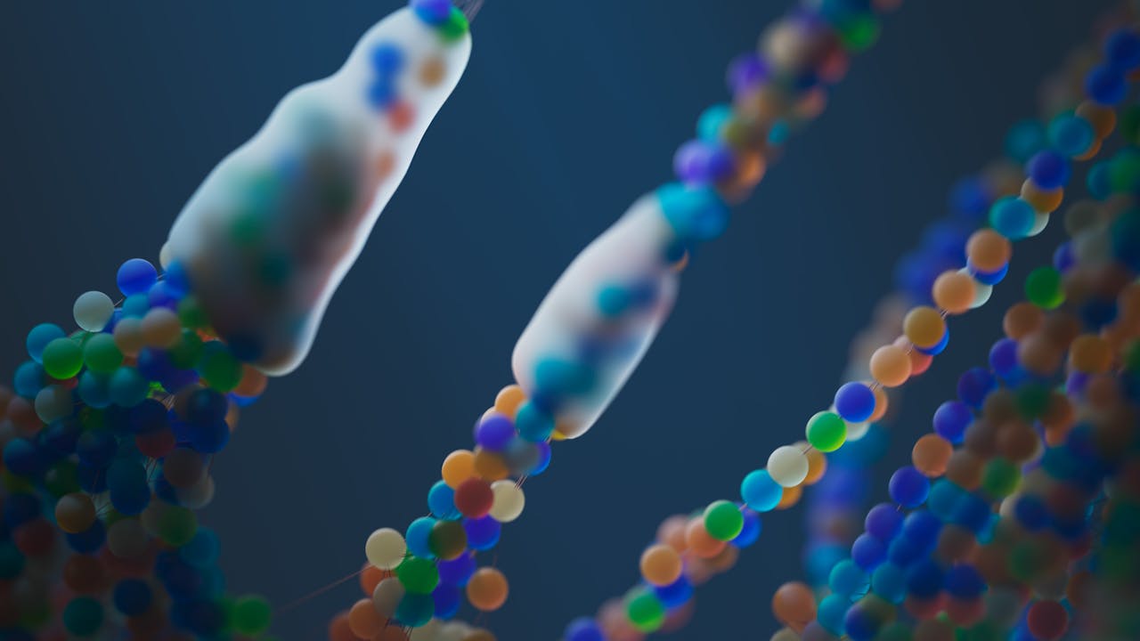 An abstract close-up rendering of molecular and DNA-like structures