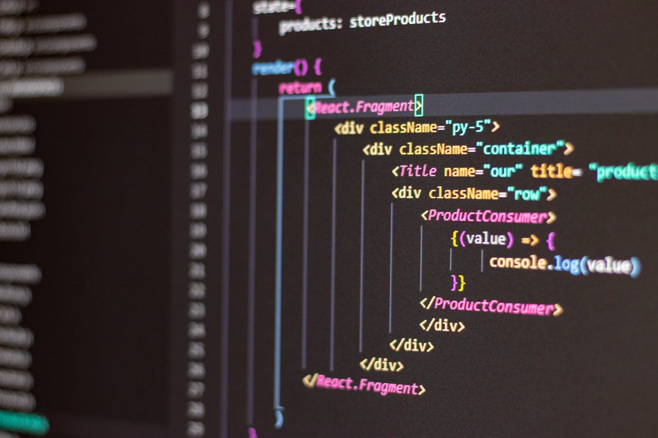 A close-up of programming code on a dark monitor